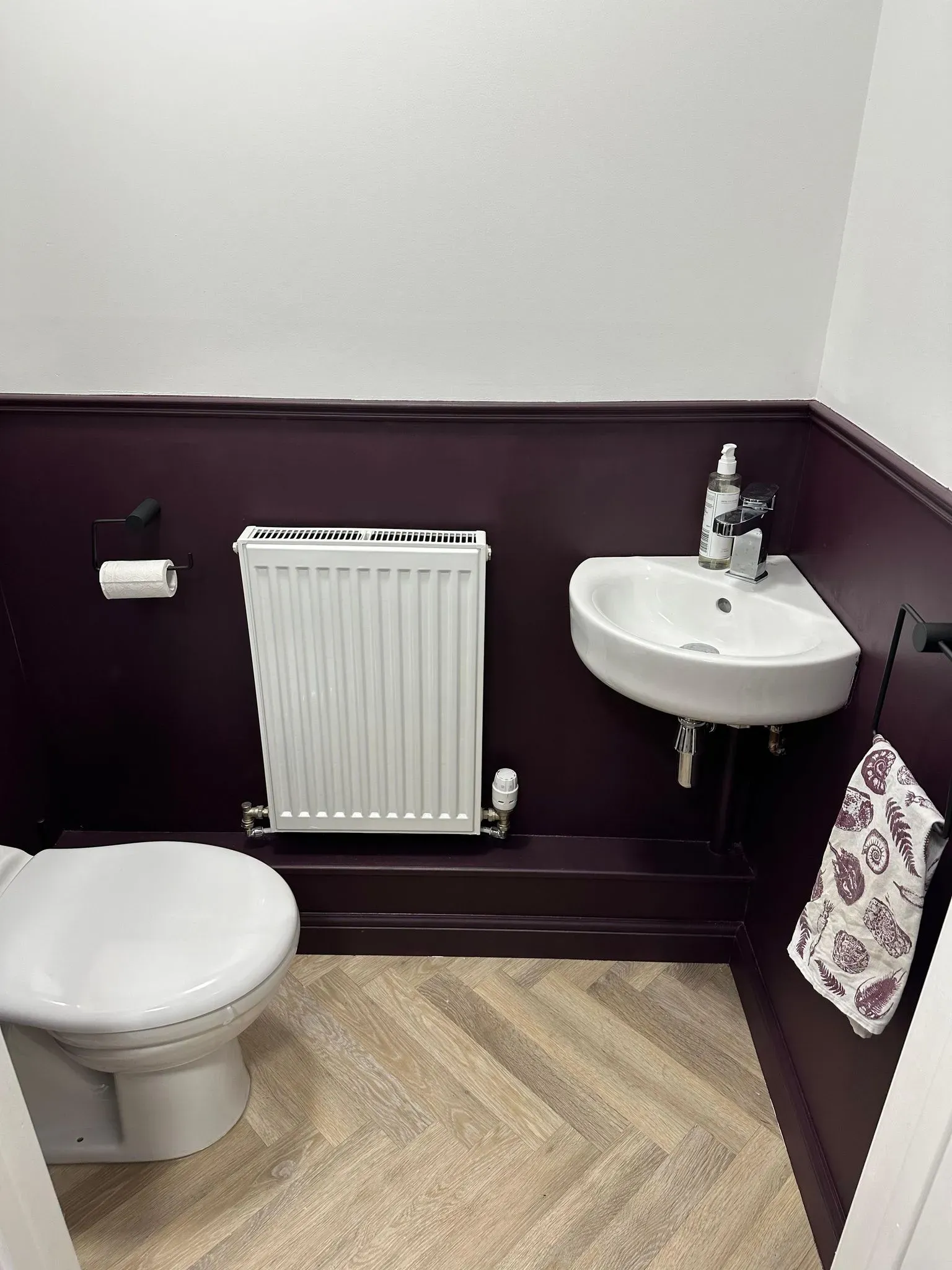 Modern downstairs bathroom renovation with dark plum walls and herringbone floor - DP Carpentry & Building LTD, Gloucestershire