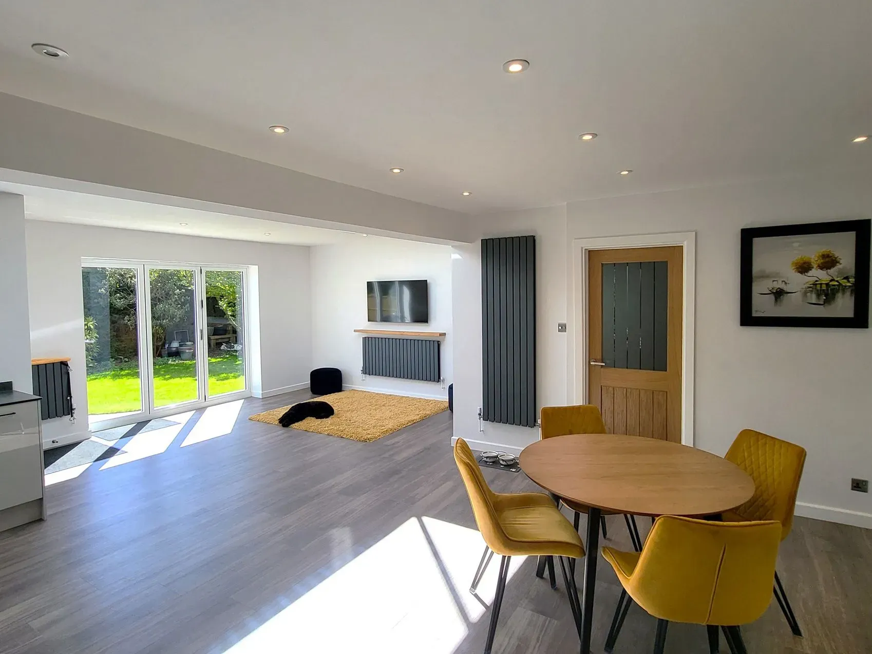 Modern open-plan living room renovation in Hatherley by DP Carpentry & Building